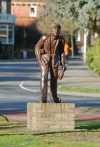 Bronzen beeld De Textielarbeider